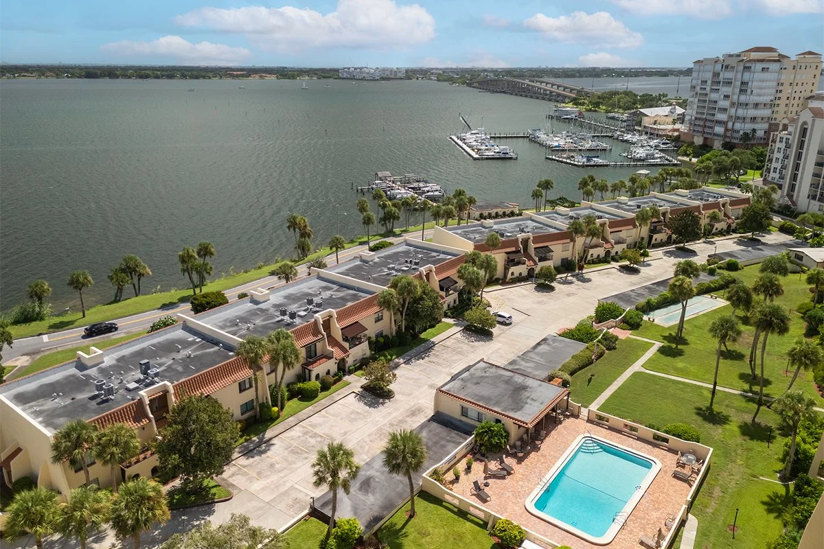 Aerial view of 115 River Drive condos along the Indian River, Cocoa F