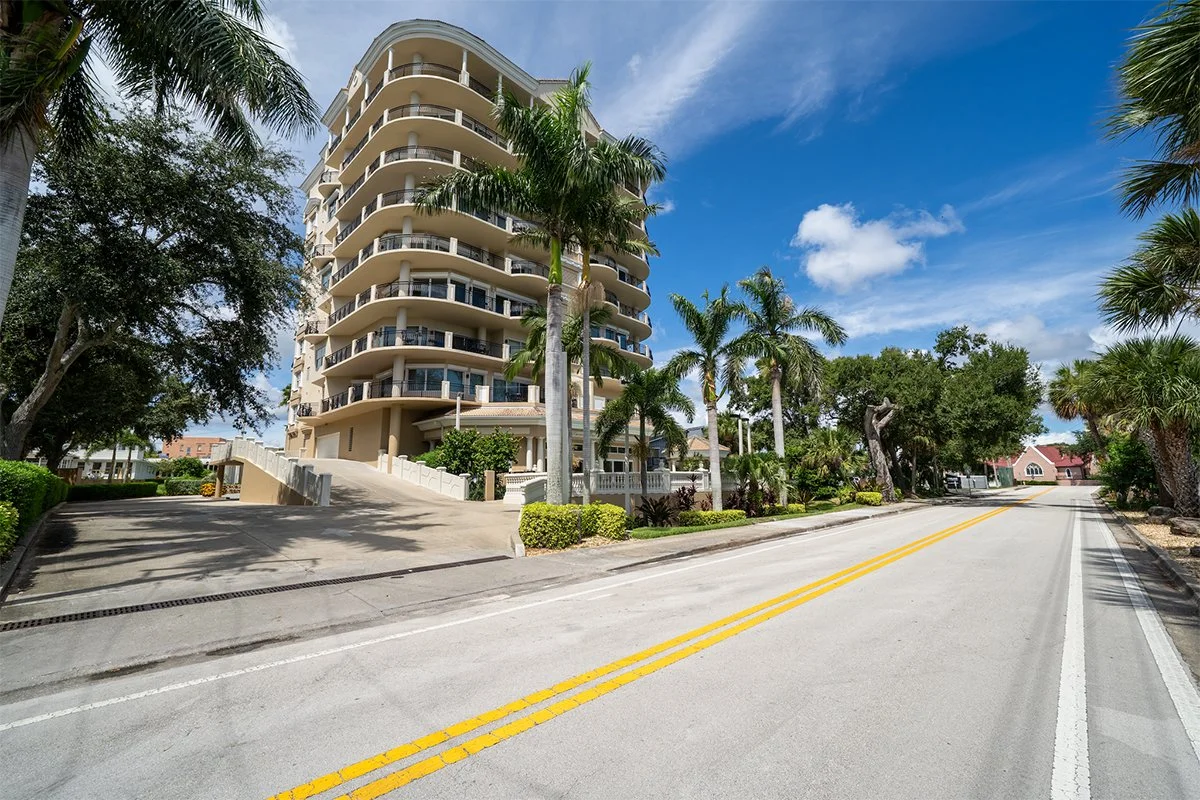 Ground-level view looking up at Twenty One Riverside Condos in Cocoa, FL