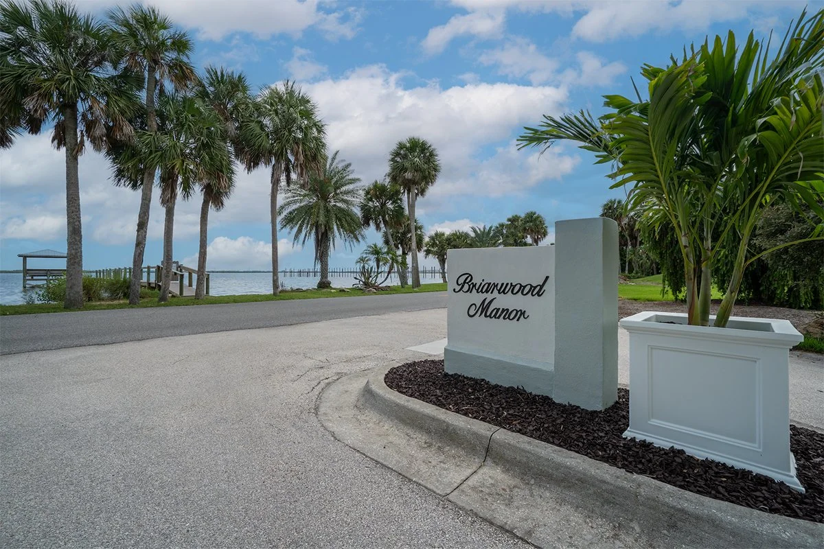 Entrance sign at Briarwood Manor, a residential community in Cocoa, FL