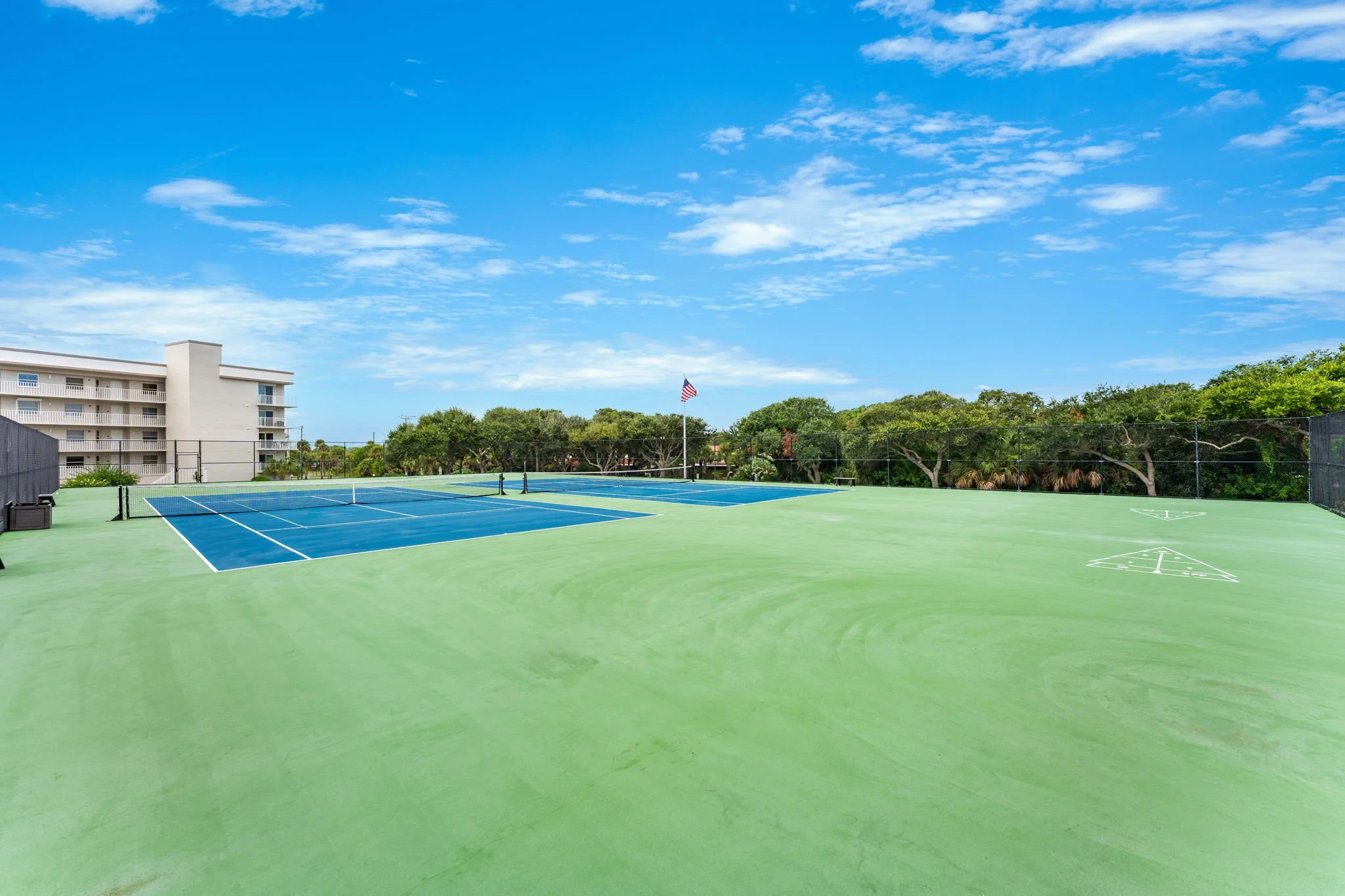community tennis courts with shuffleboard.jpg