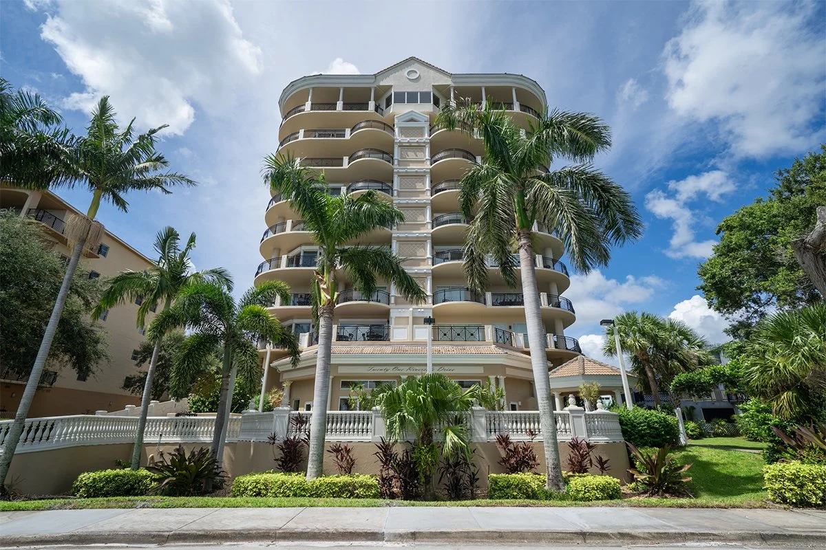 Ground-level view looking up at Twenty One Riverside Condos in Cocoa, FL