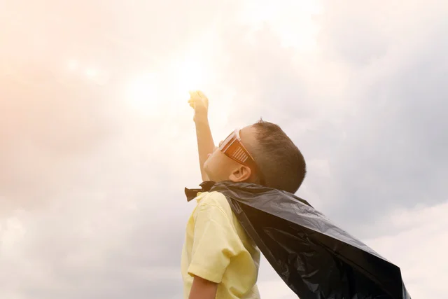 Canva - Happy Kid Play Superhero , Boy Power Concept.jpeg