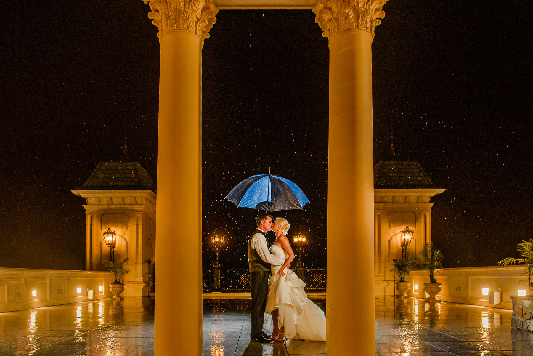The Legacy Castle Wedding bride and groom in rain