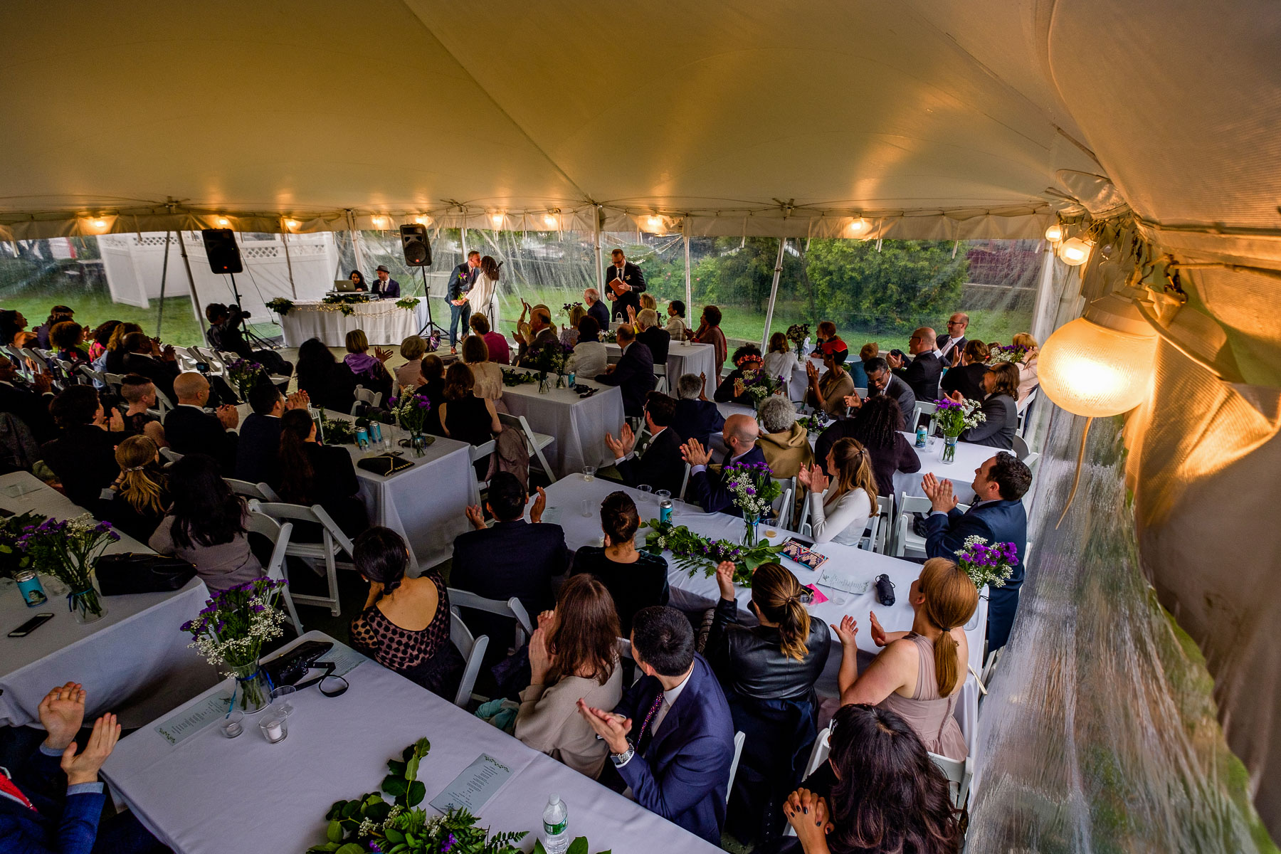 Onderdonk House Wedding  bride and groom kiss ceremony