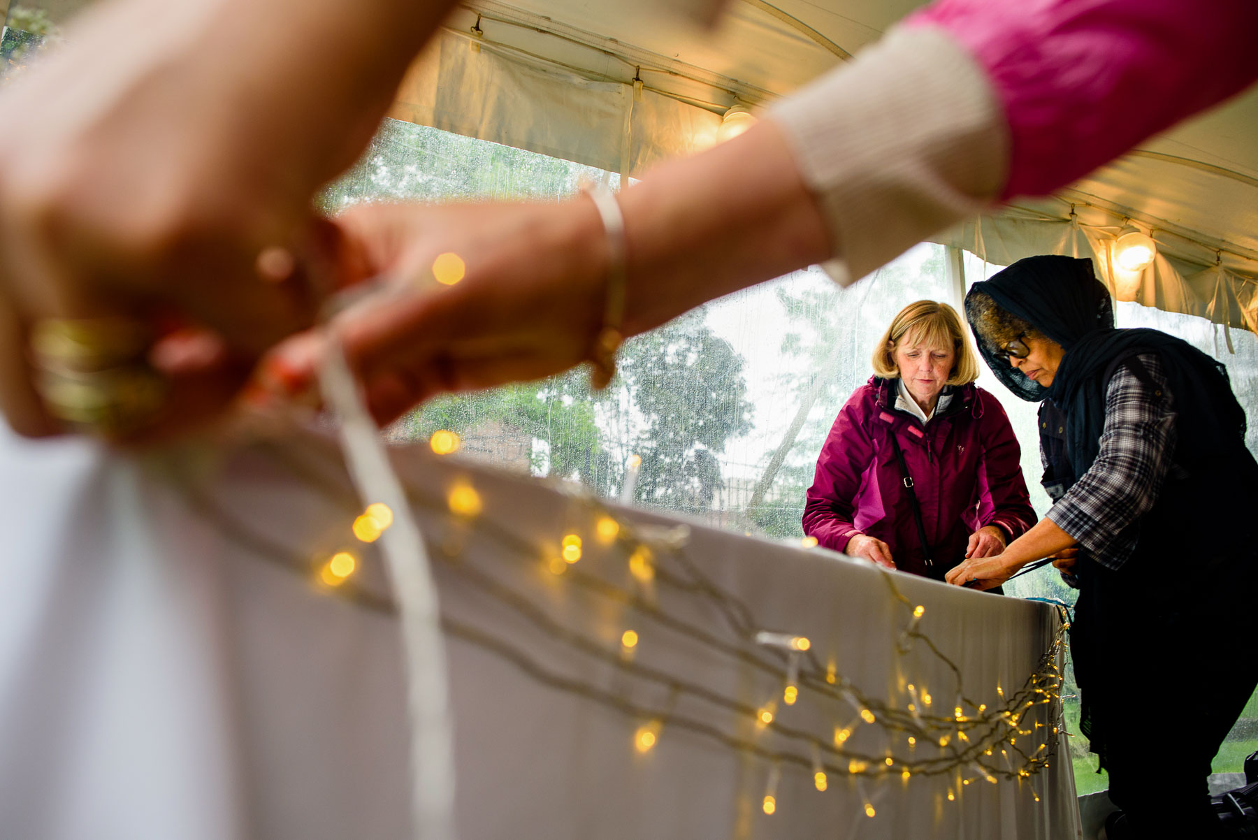 Onderdonk House Wedding setting up tables