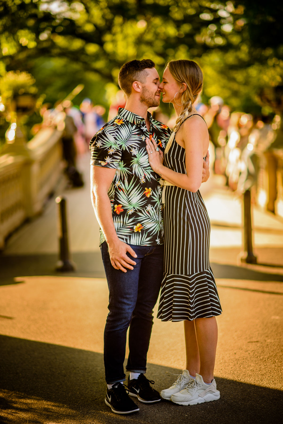 Central Park NYC Proposal Couple Kiss Bow Bridge  