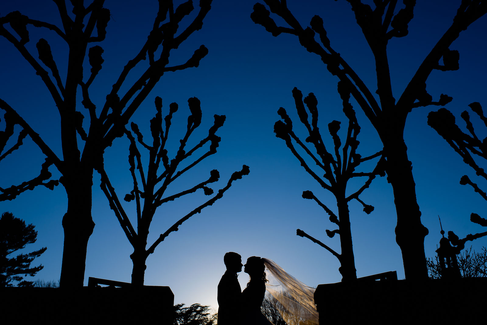NYIT de Seversky Mansion Wedding bride and groom blue skies and 