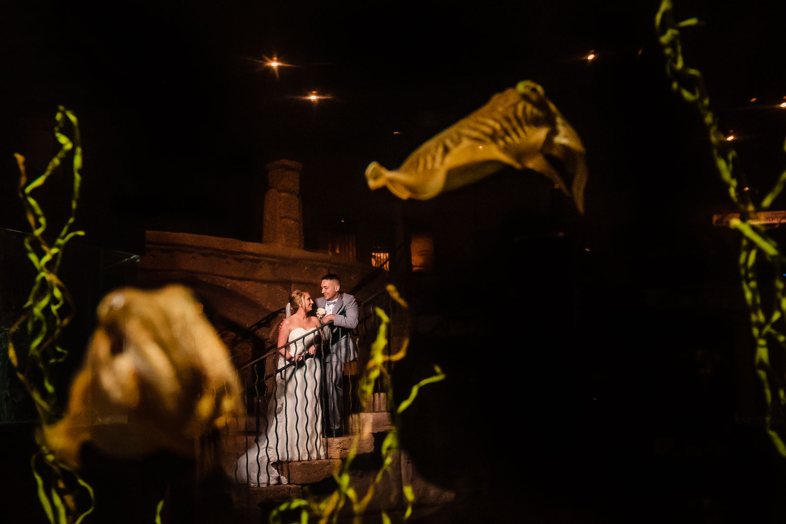 Couple portrait through an aquarium