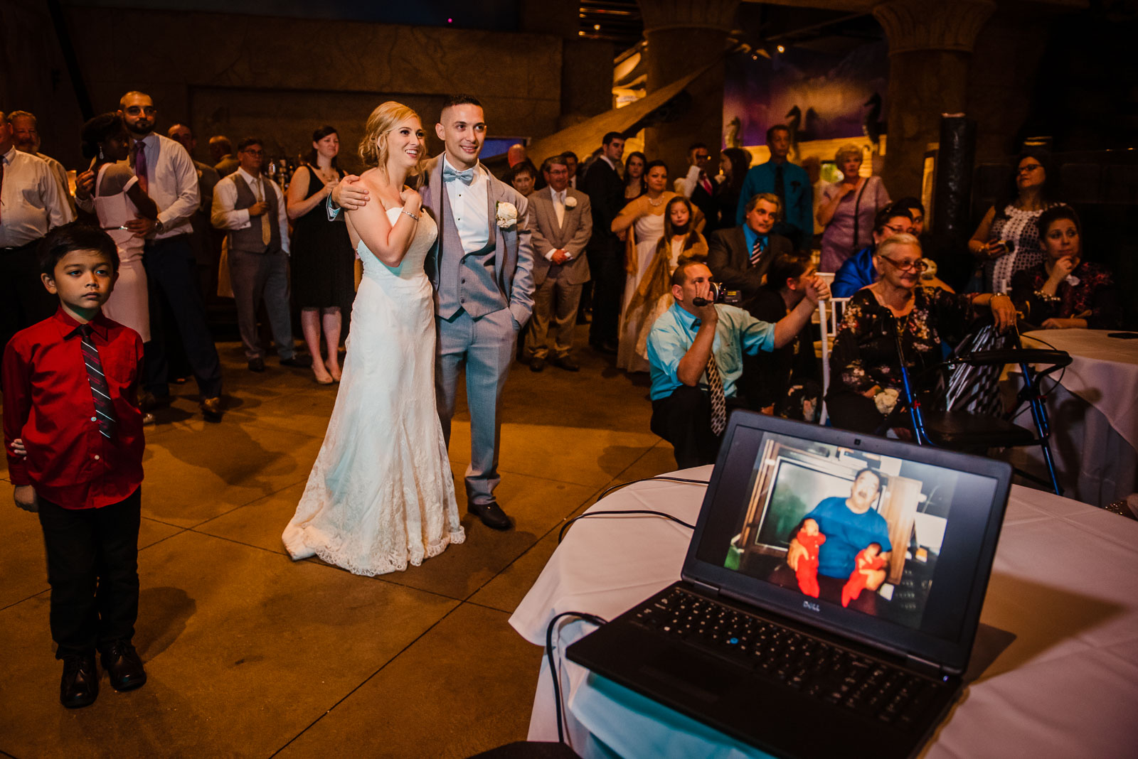 Couple and Guests watch slideshow