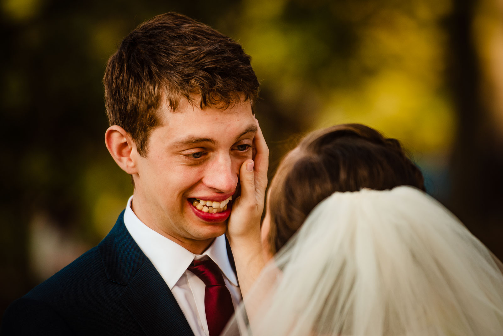 First look groom cry