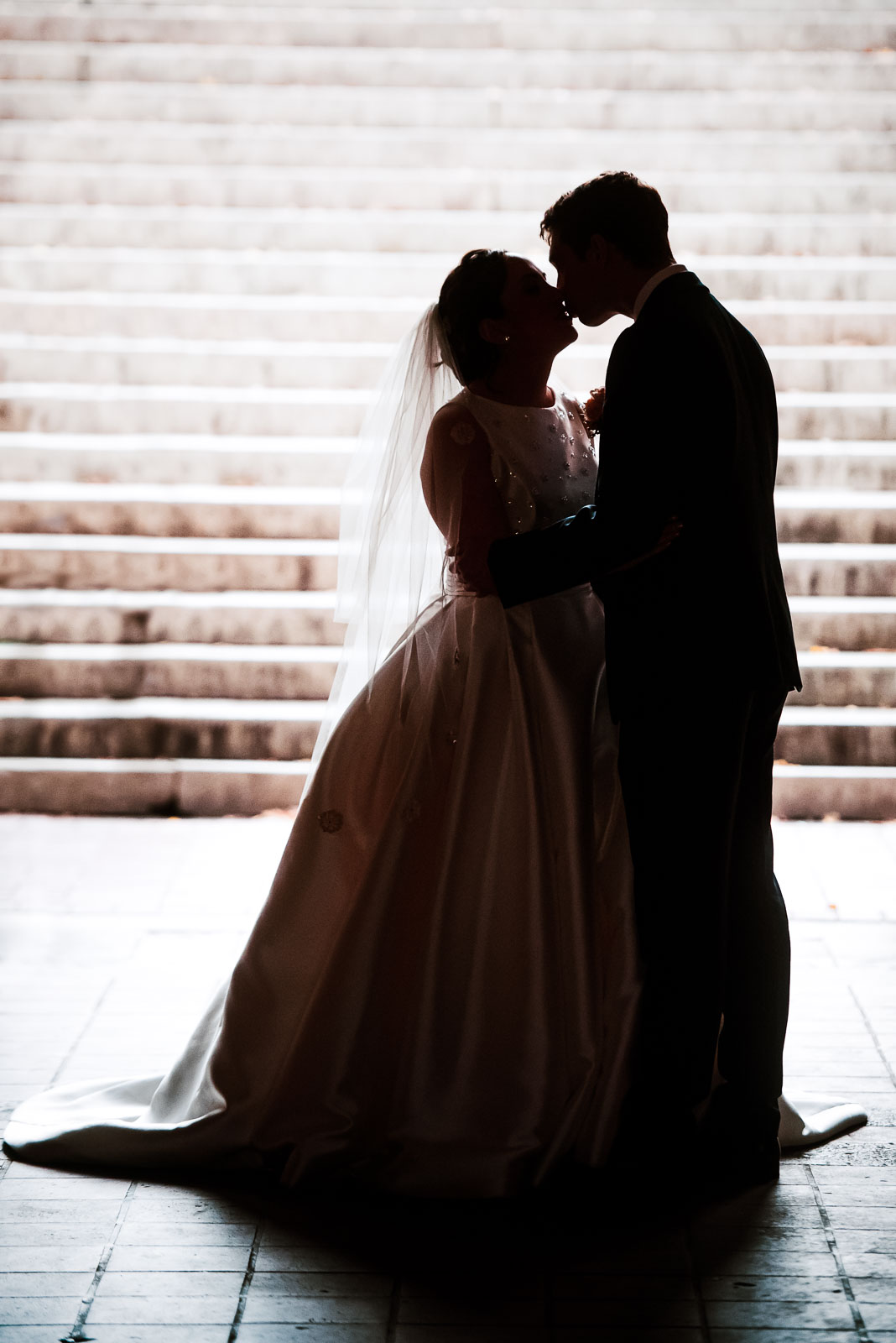 Bride and groom portrait on steps  