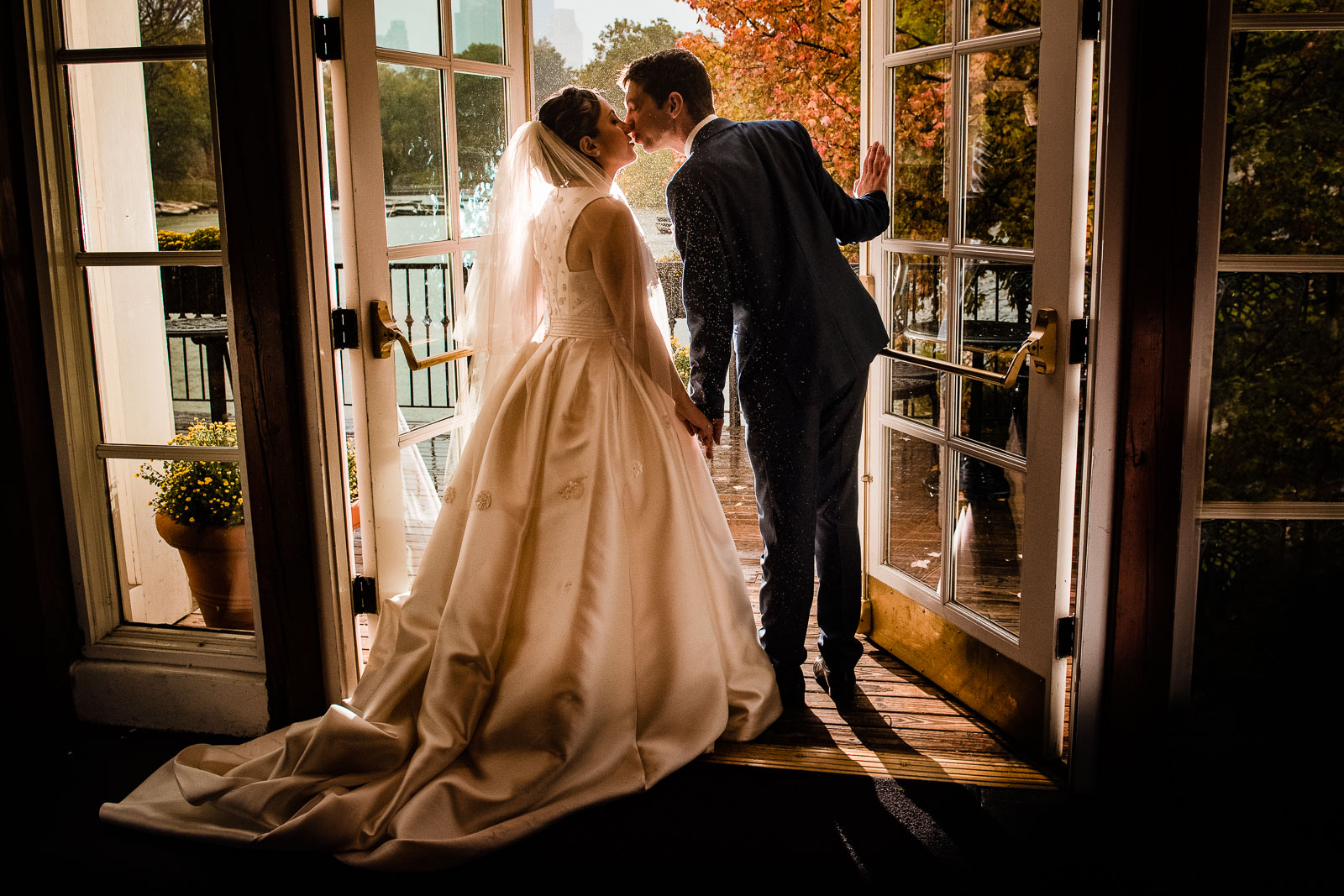 Bride and groom doorway portrait