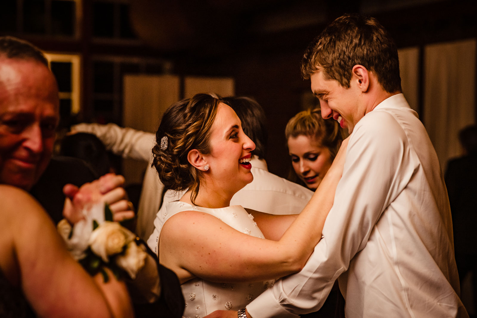 Bride and groom dance at reception