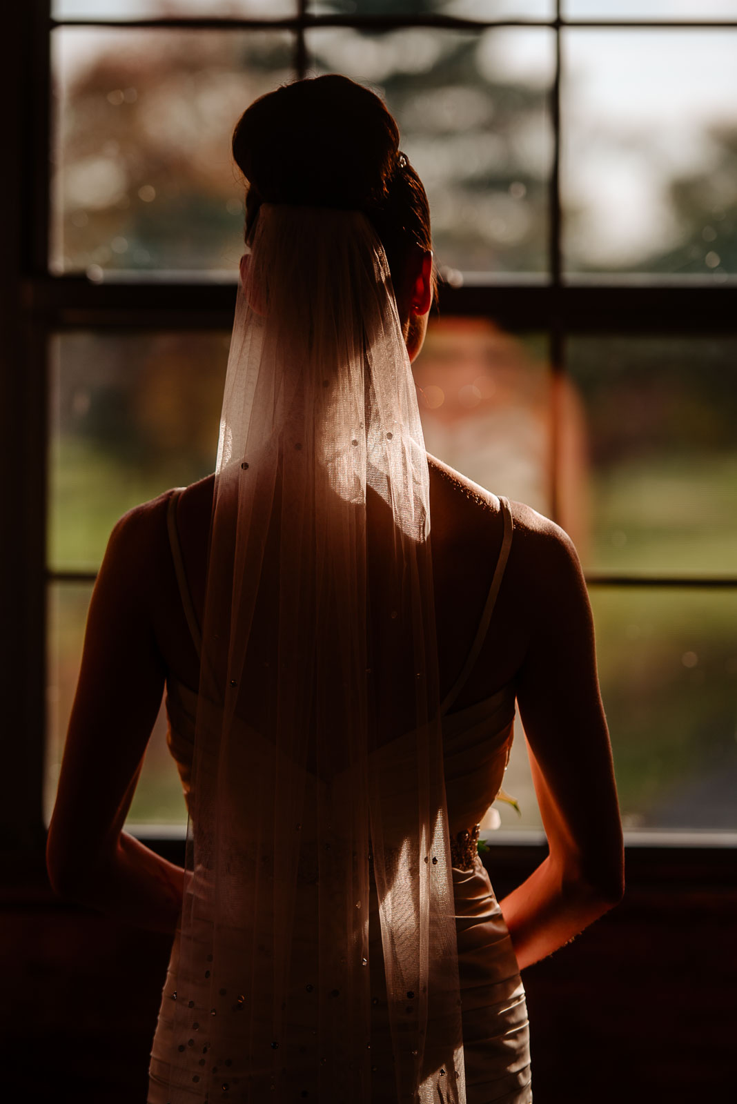 Bride looks out the window