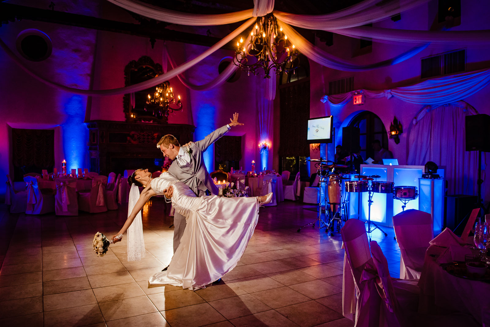 Bride and groom portrait in ballroom