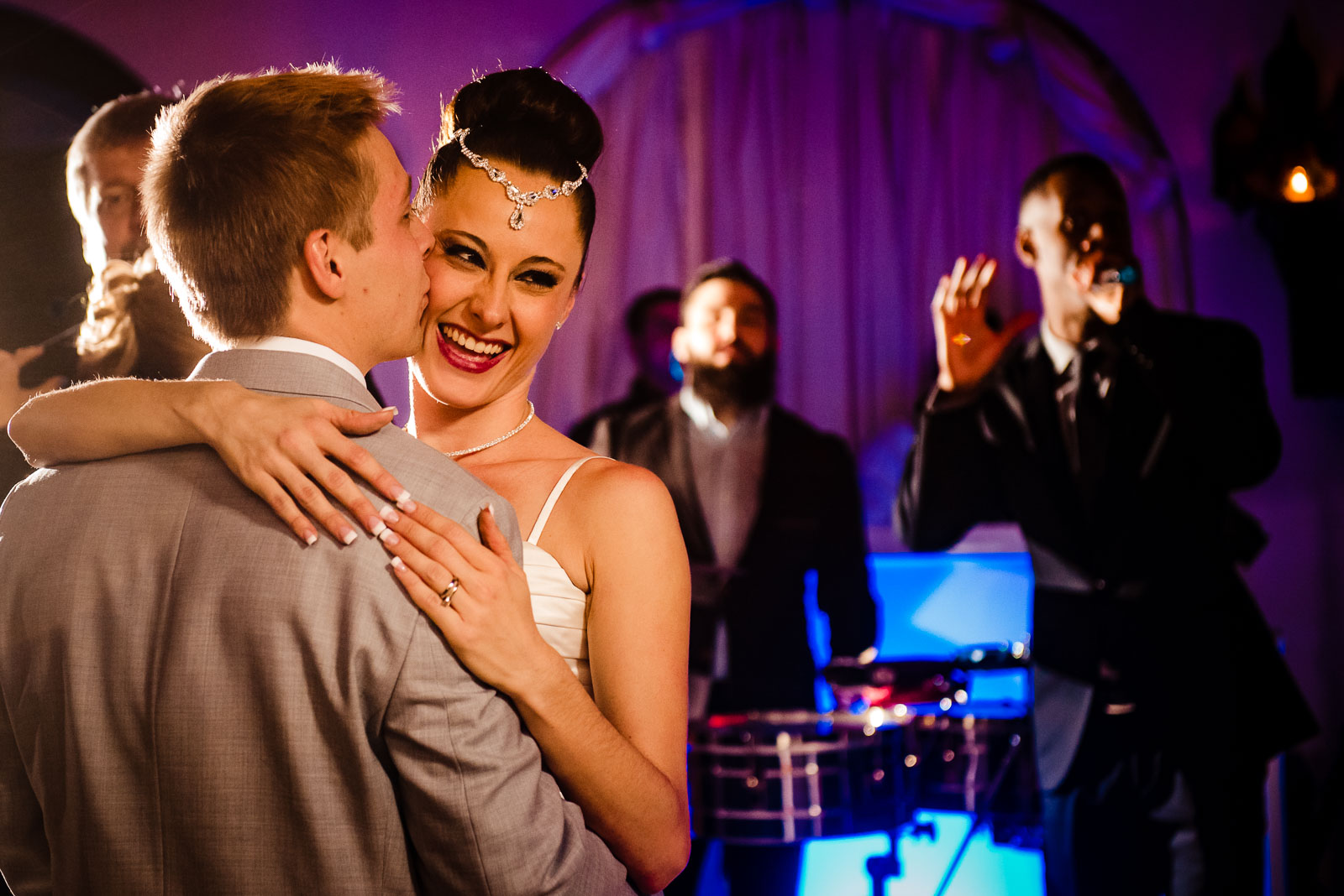 Groom kisses bride