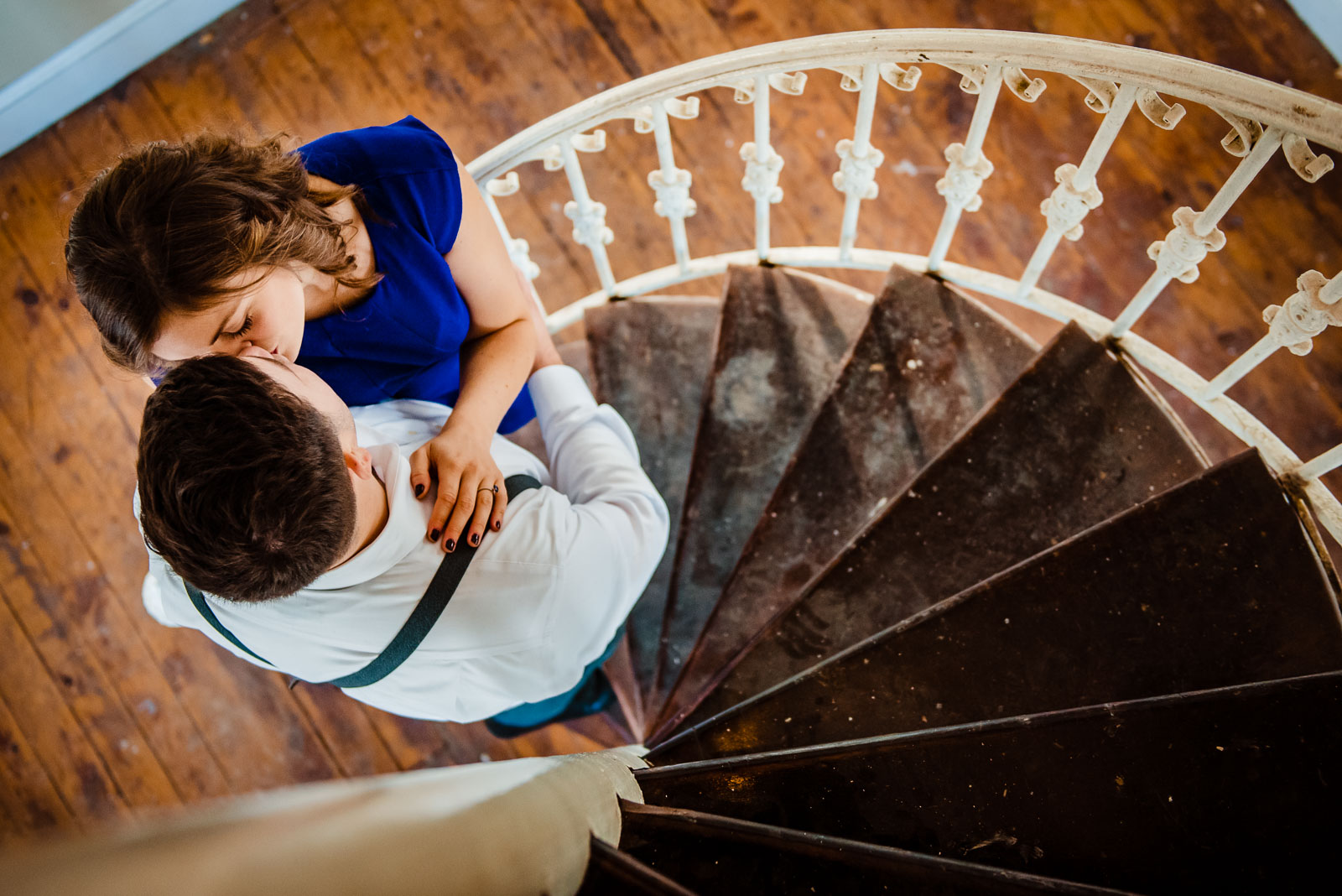 Couple's portrait on a spiral satircase