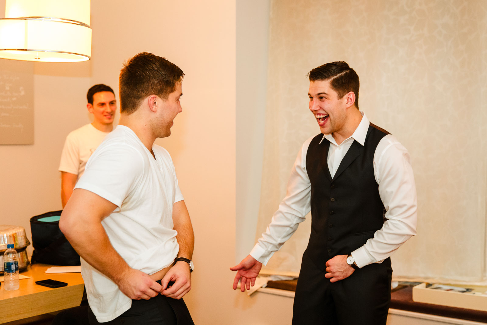  Groom and his brother get ready at Andaz Hotel on Wall Street 