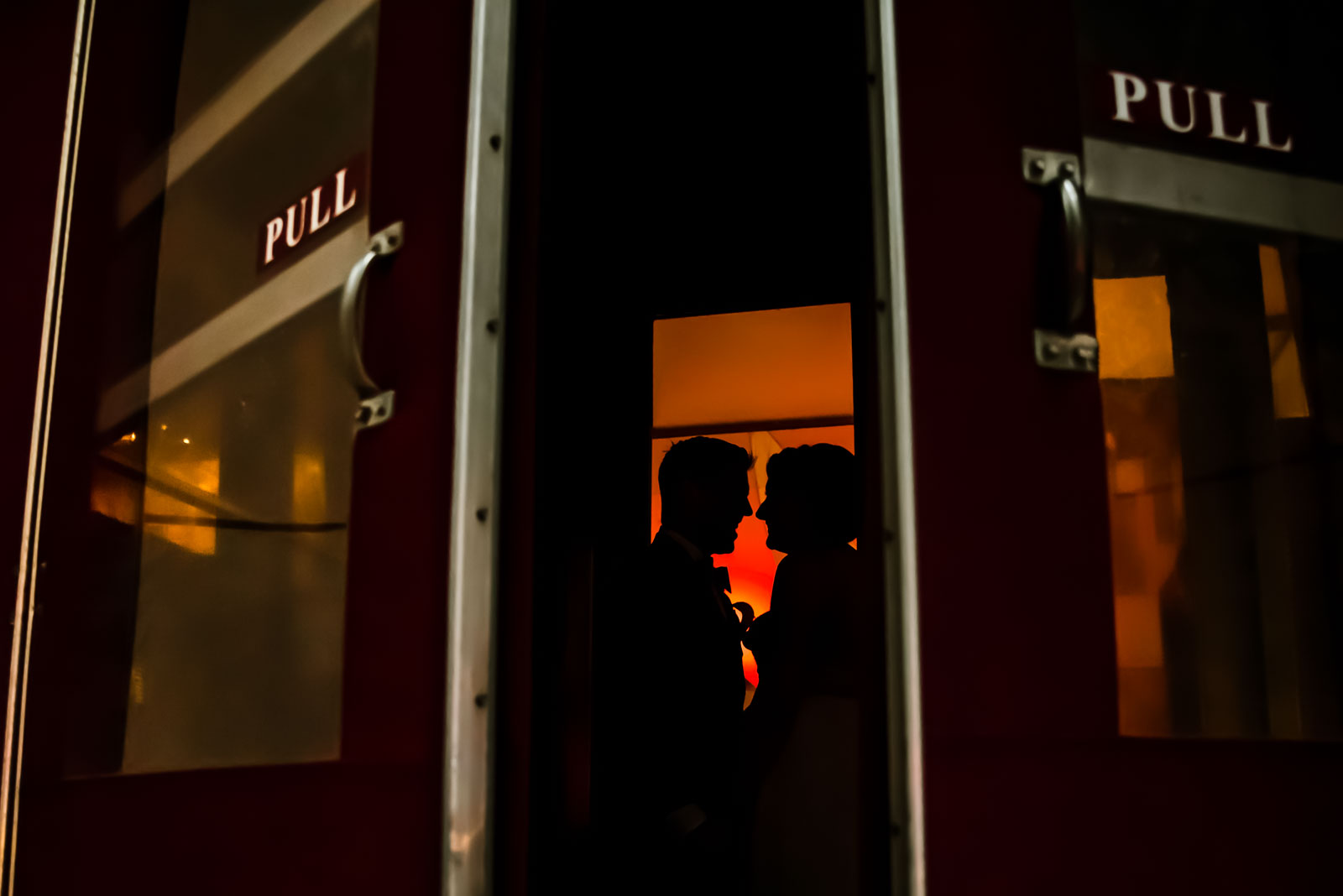 Bride and groom portrait in the doorway