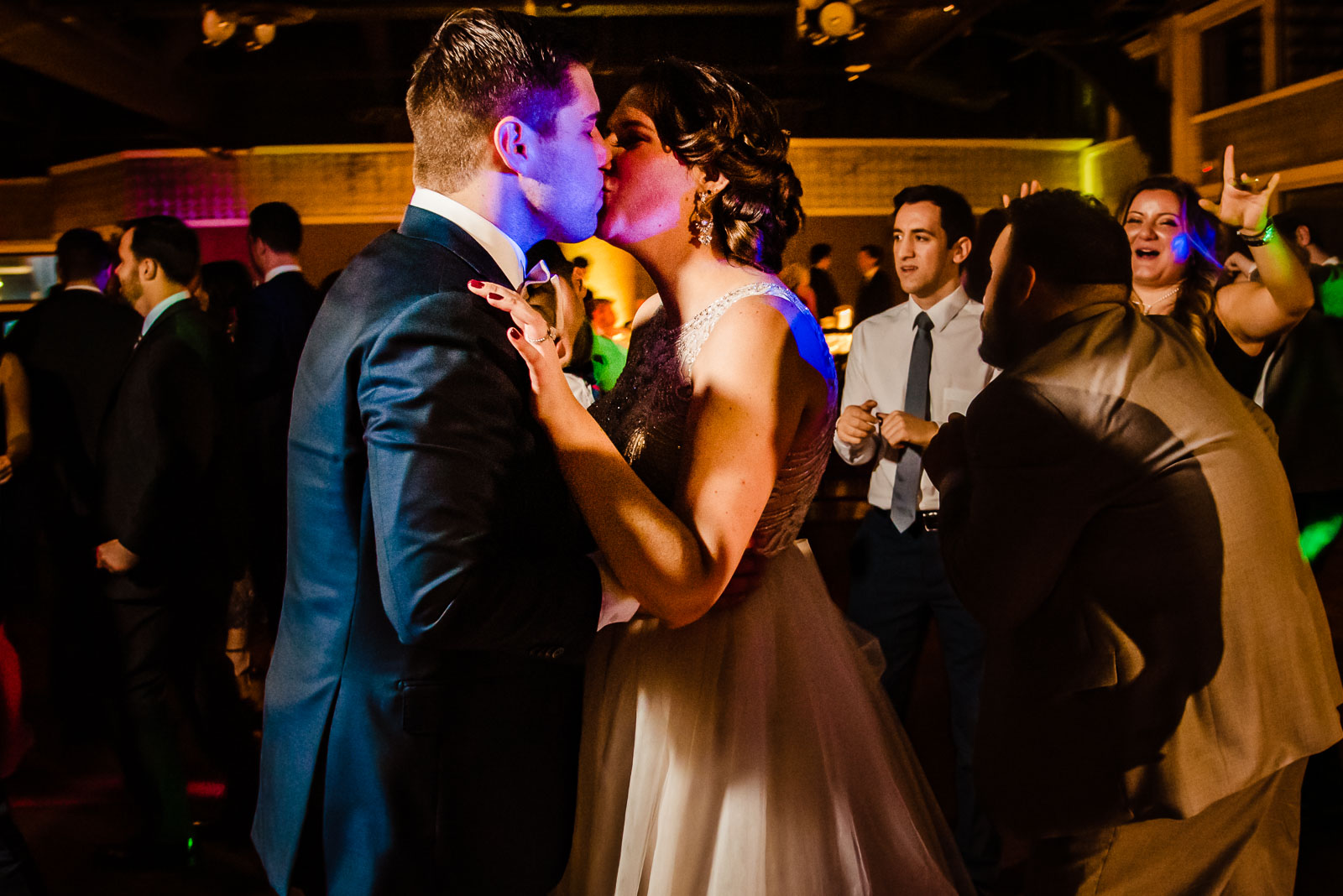 Bride and groom kiss