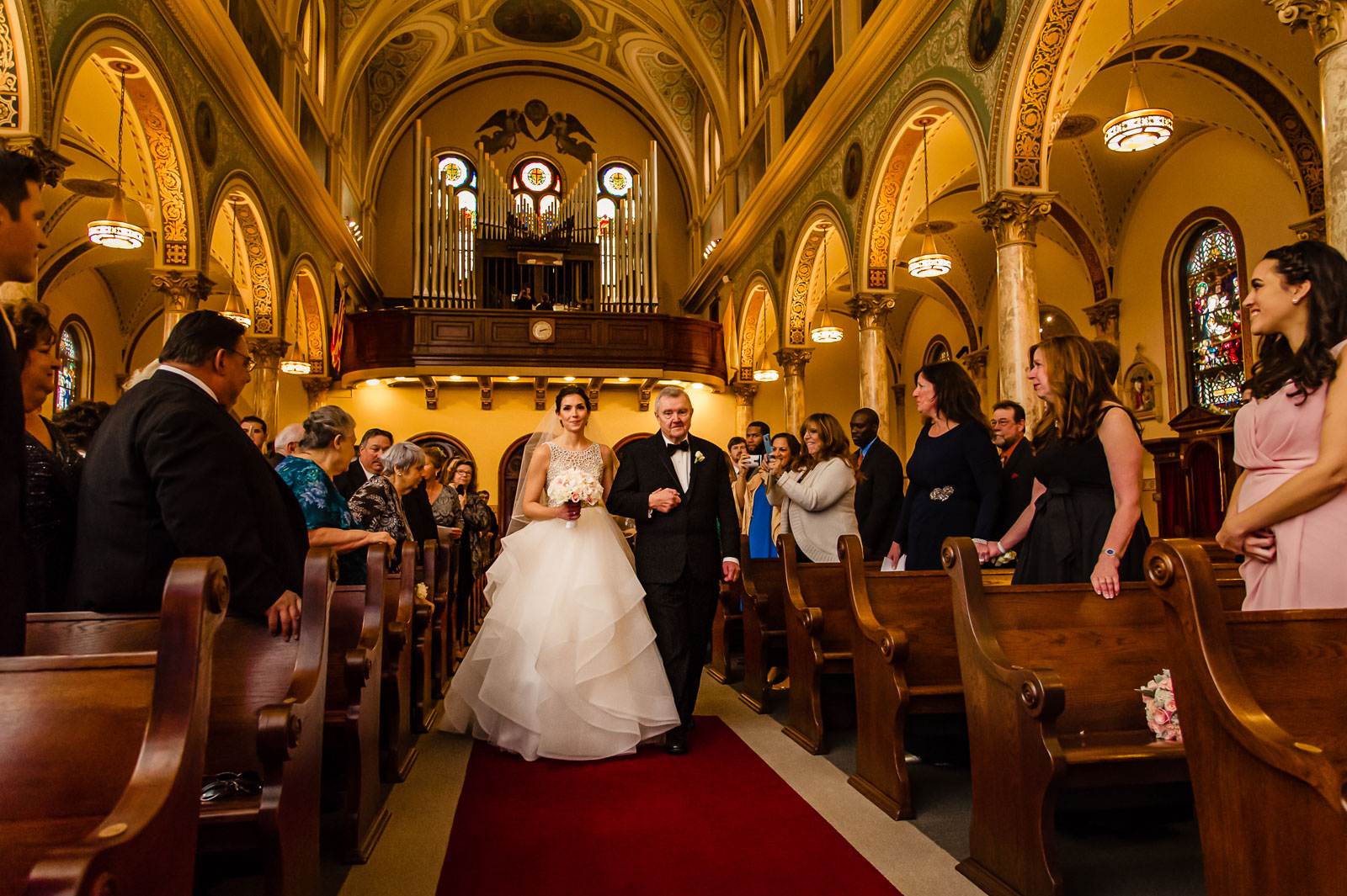 Fahter walks bride in church