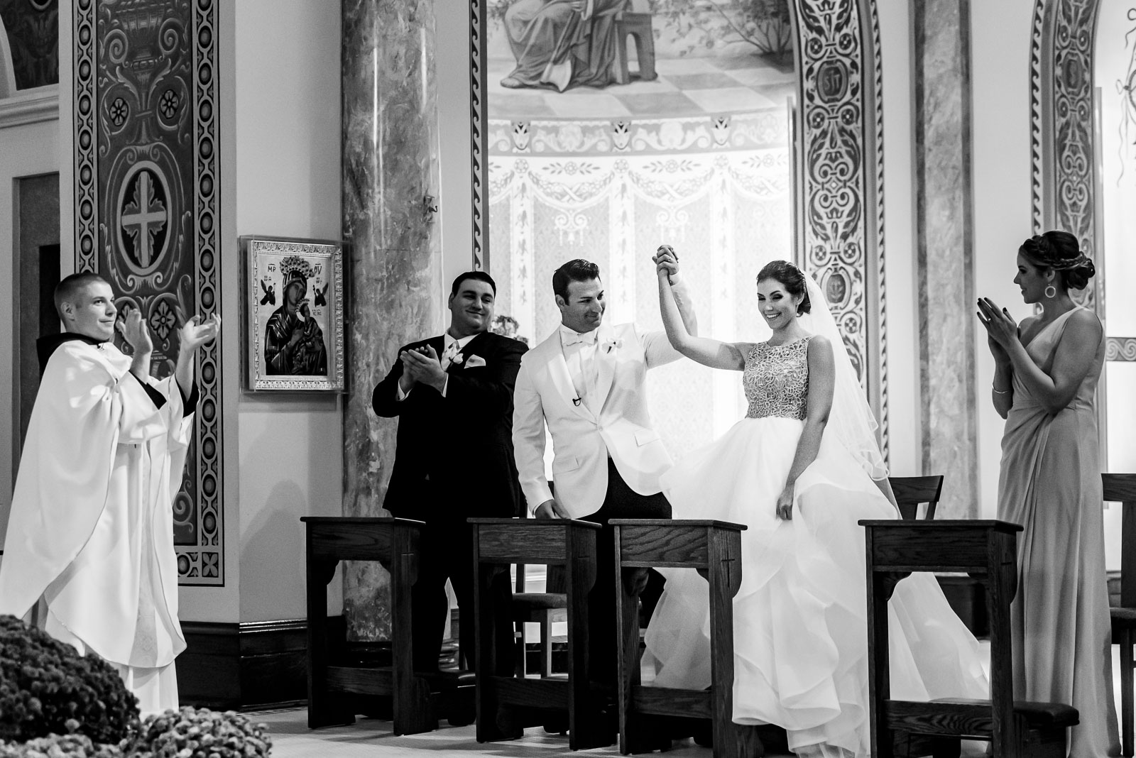 Bride and groom celebrate during ceremony