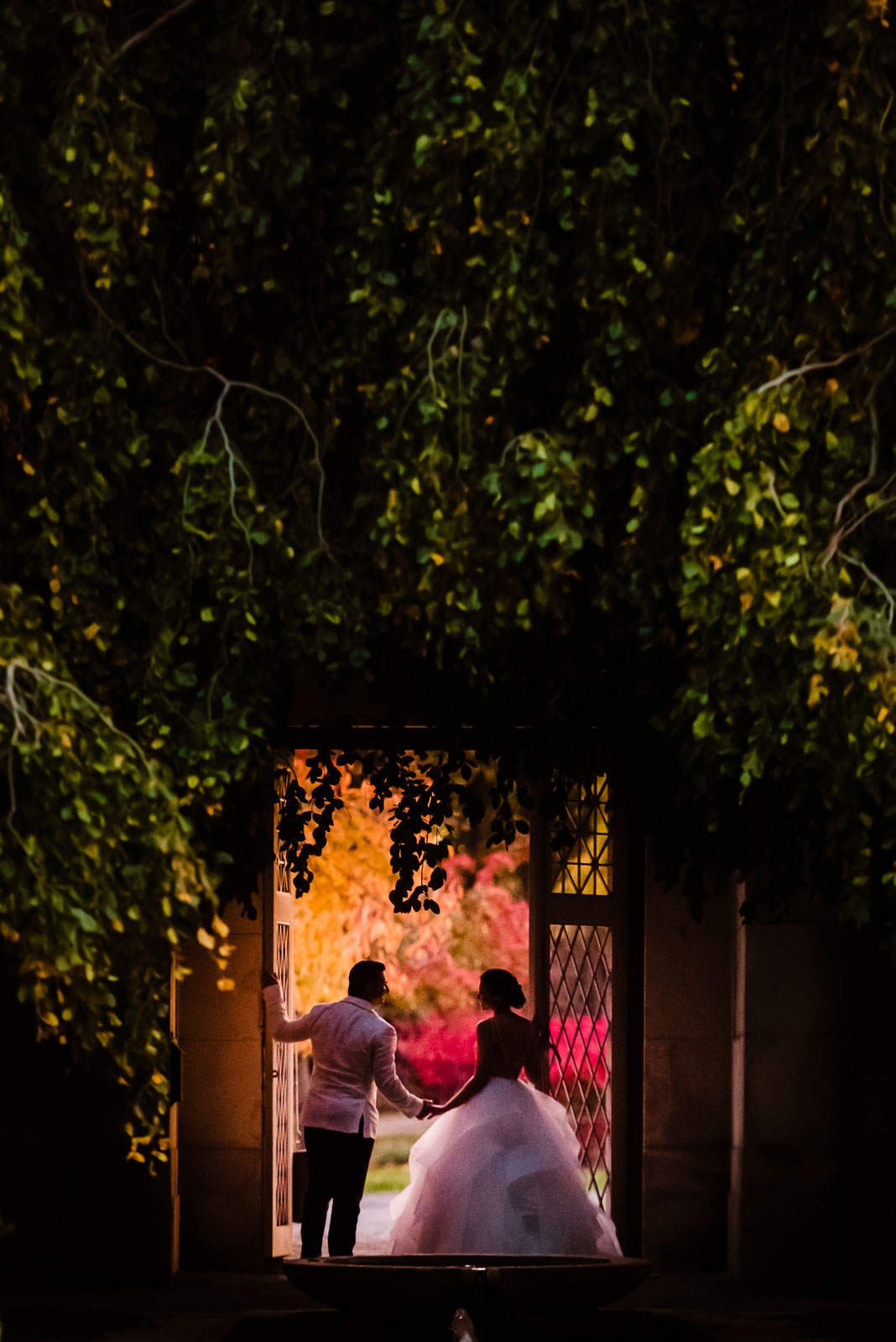 Bride and groom doorway portait