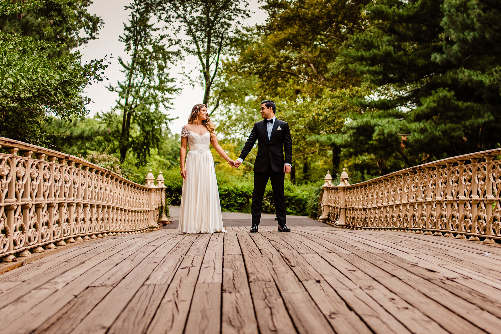 Brdie and groom portrait on bridge