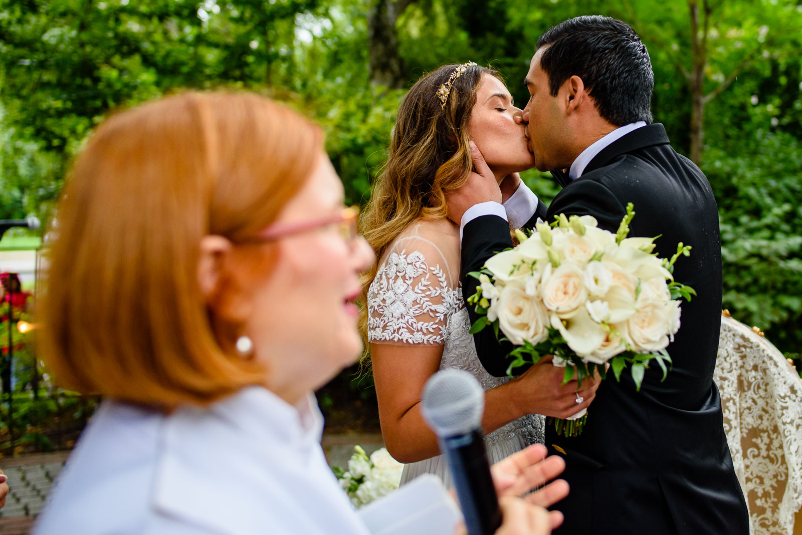 Bride and groom first kiss during ceremony