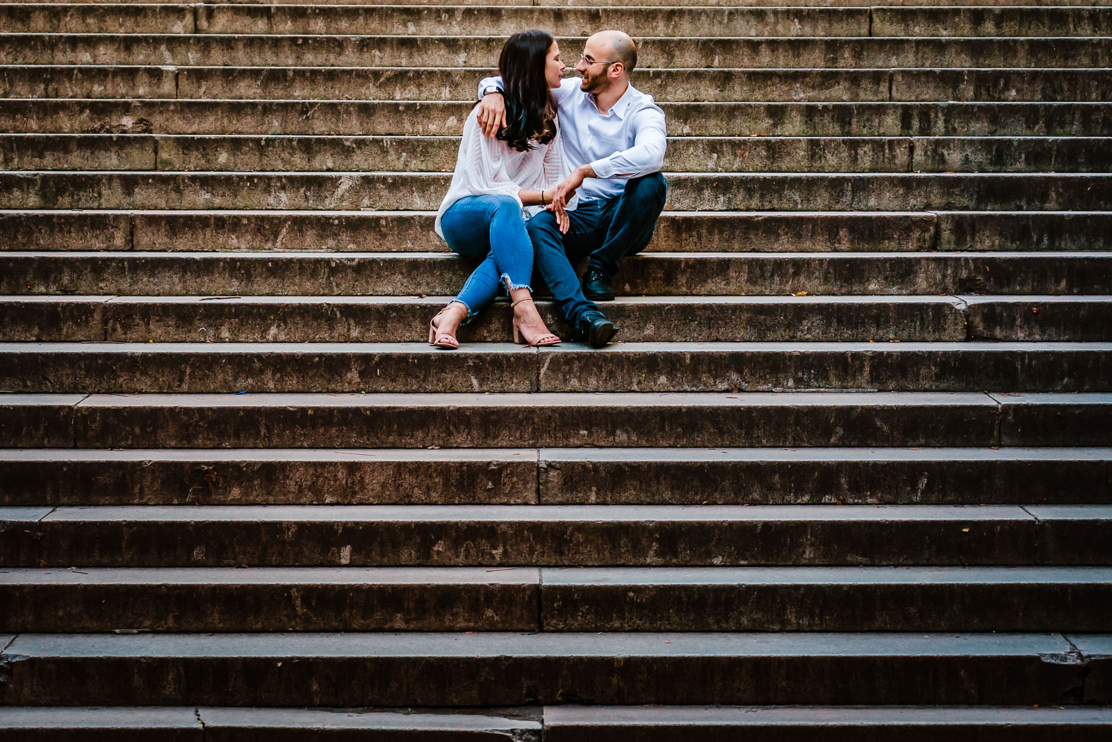 Couple's portrait on steps of bethesda terrace 