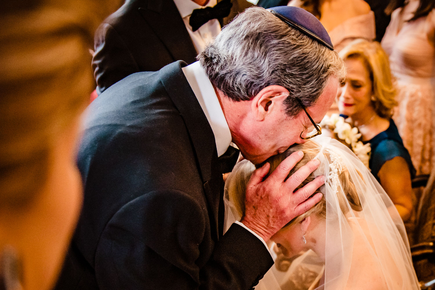 Father gives blessing to the bride