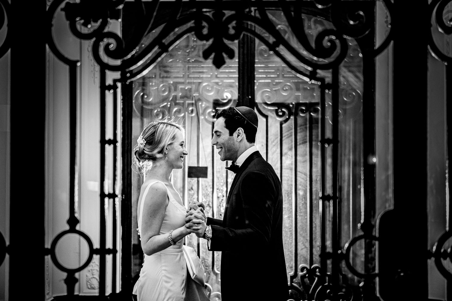 Bride and groom portrait inside the front doors