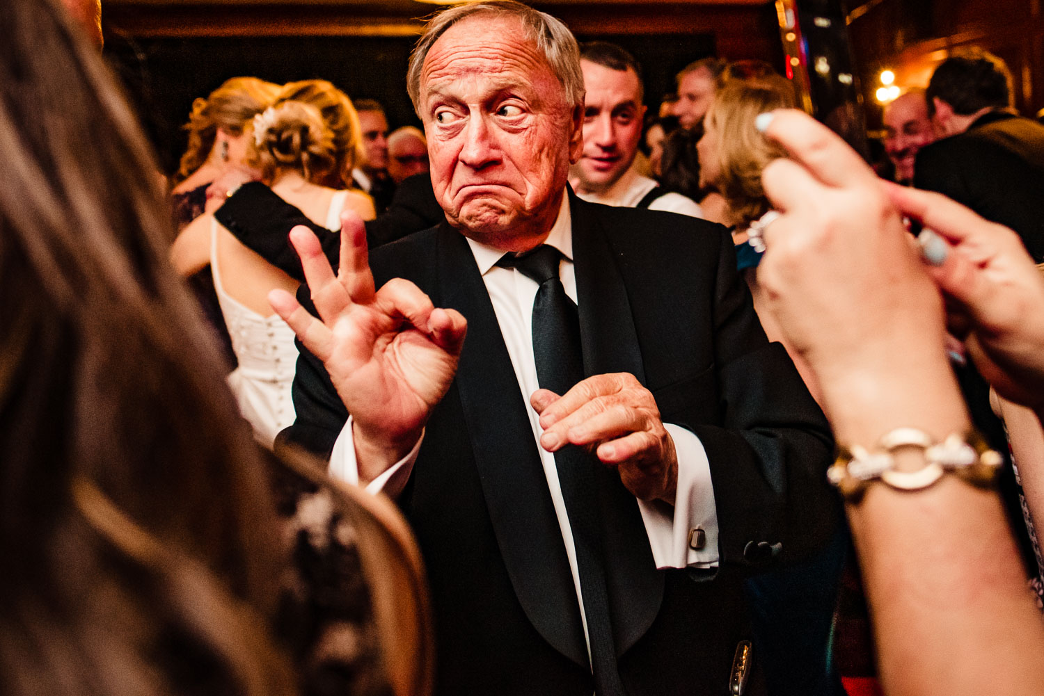 Guests dance during reception