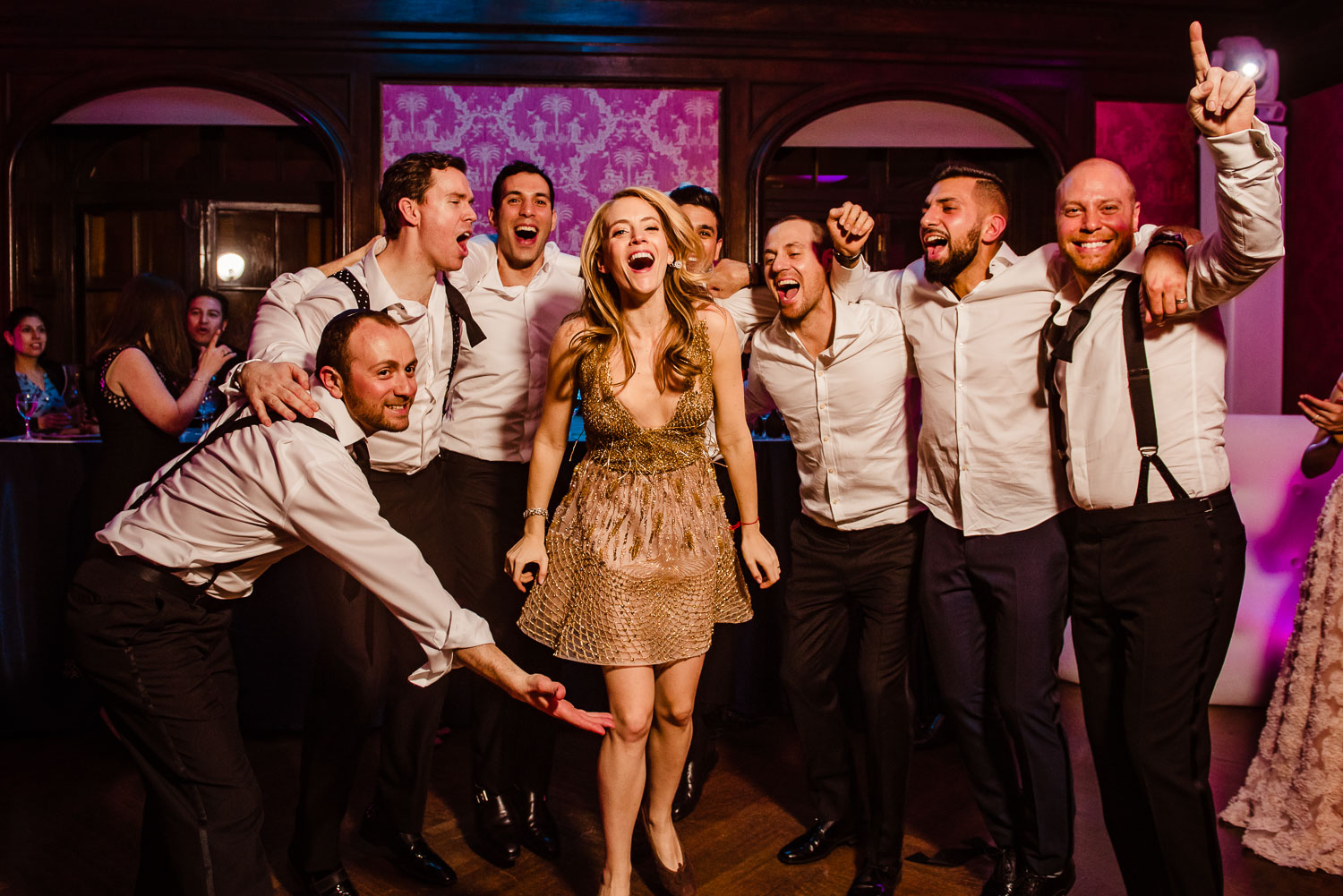 Bride and groomsmen on the dance floor