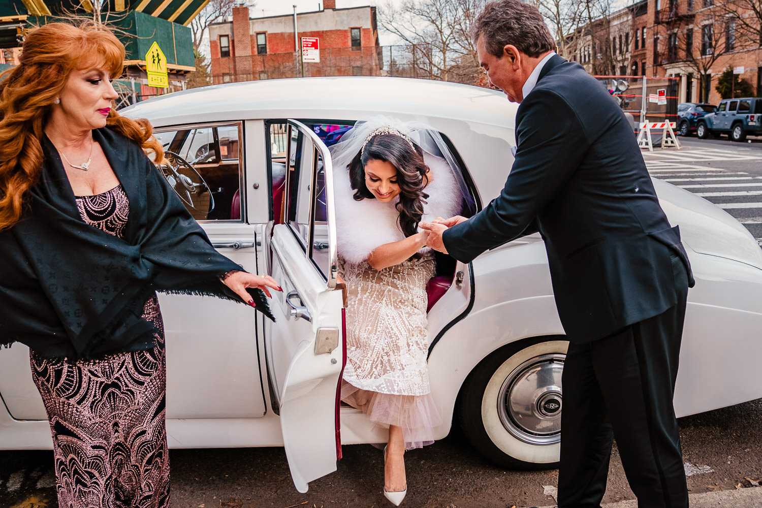Bride arrives in limo to the ceremony in Park Slope Jewish center