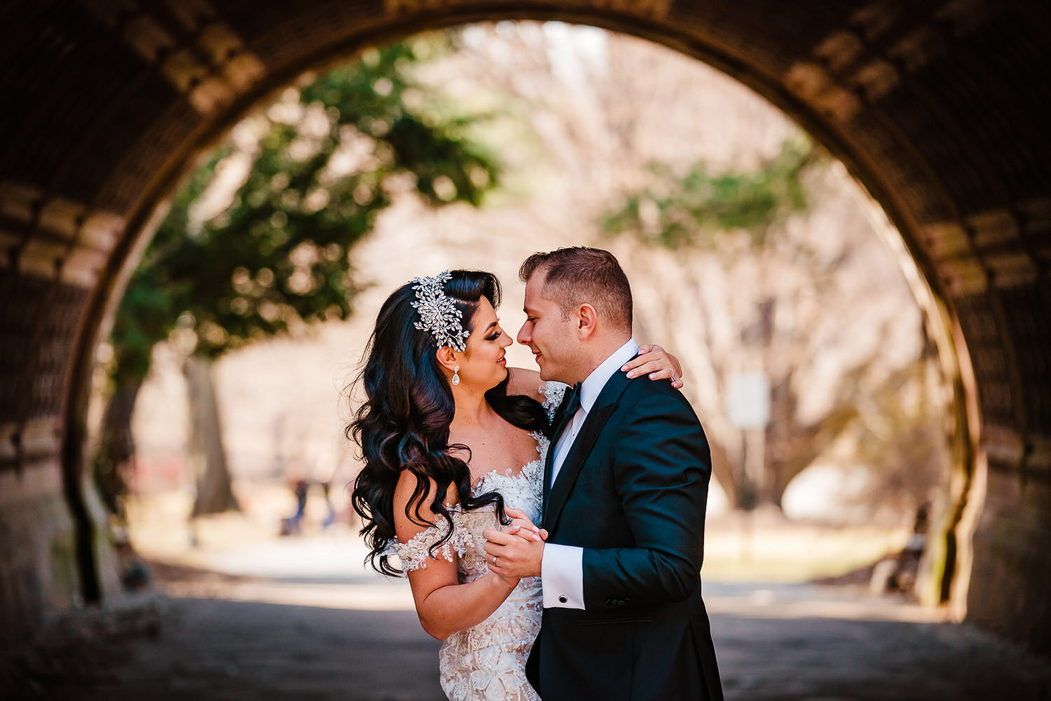 Bride and groom dance inside a tunnel at Prospect Park