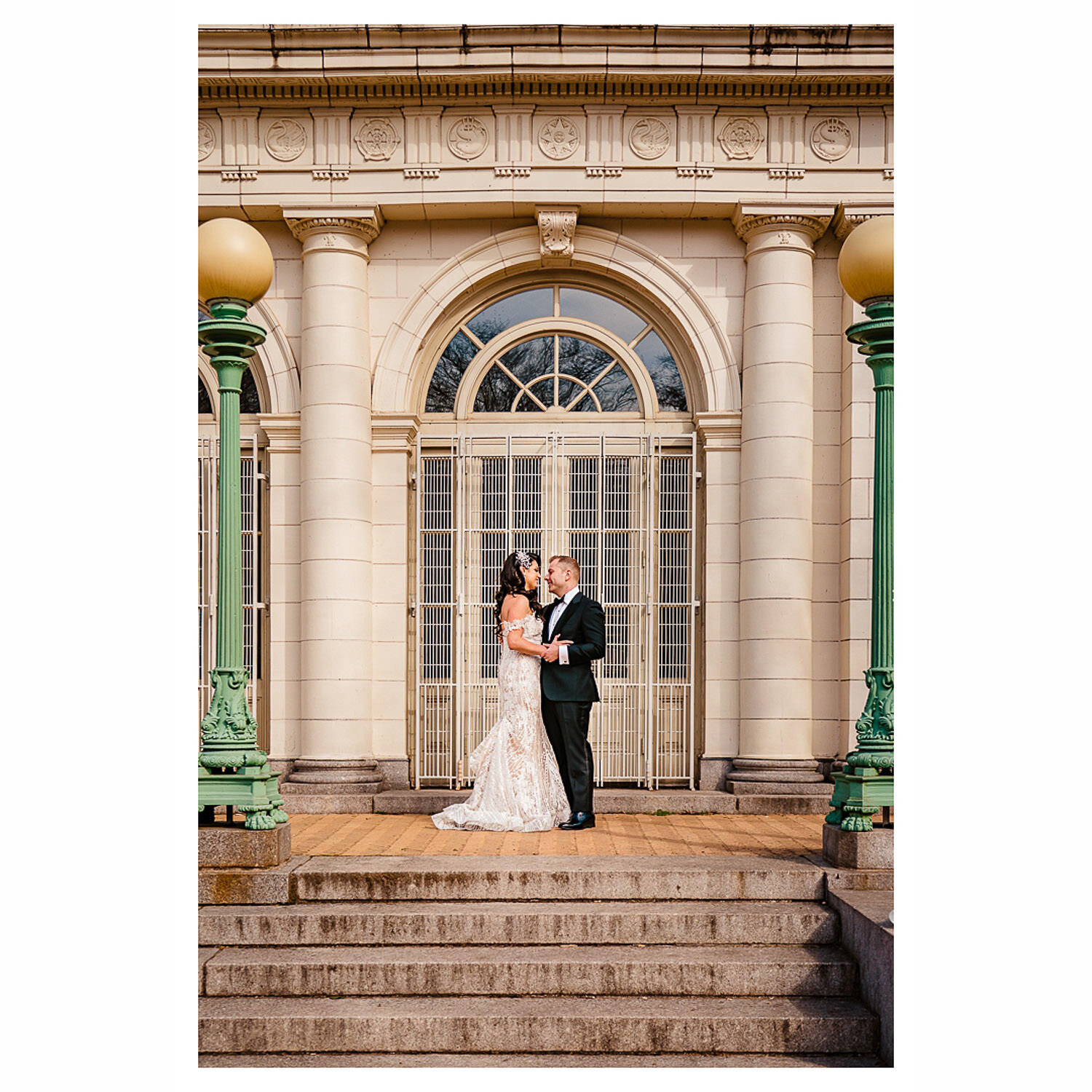 Bride and groom portrait in front of boathouse at Prospect Park