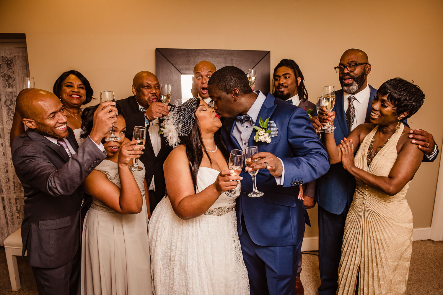 Bride and groom celebrate with family after the ceremony at The Metropolitan Caterers in Glen Cove 