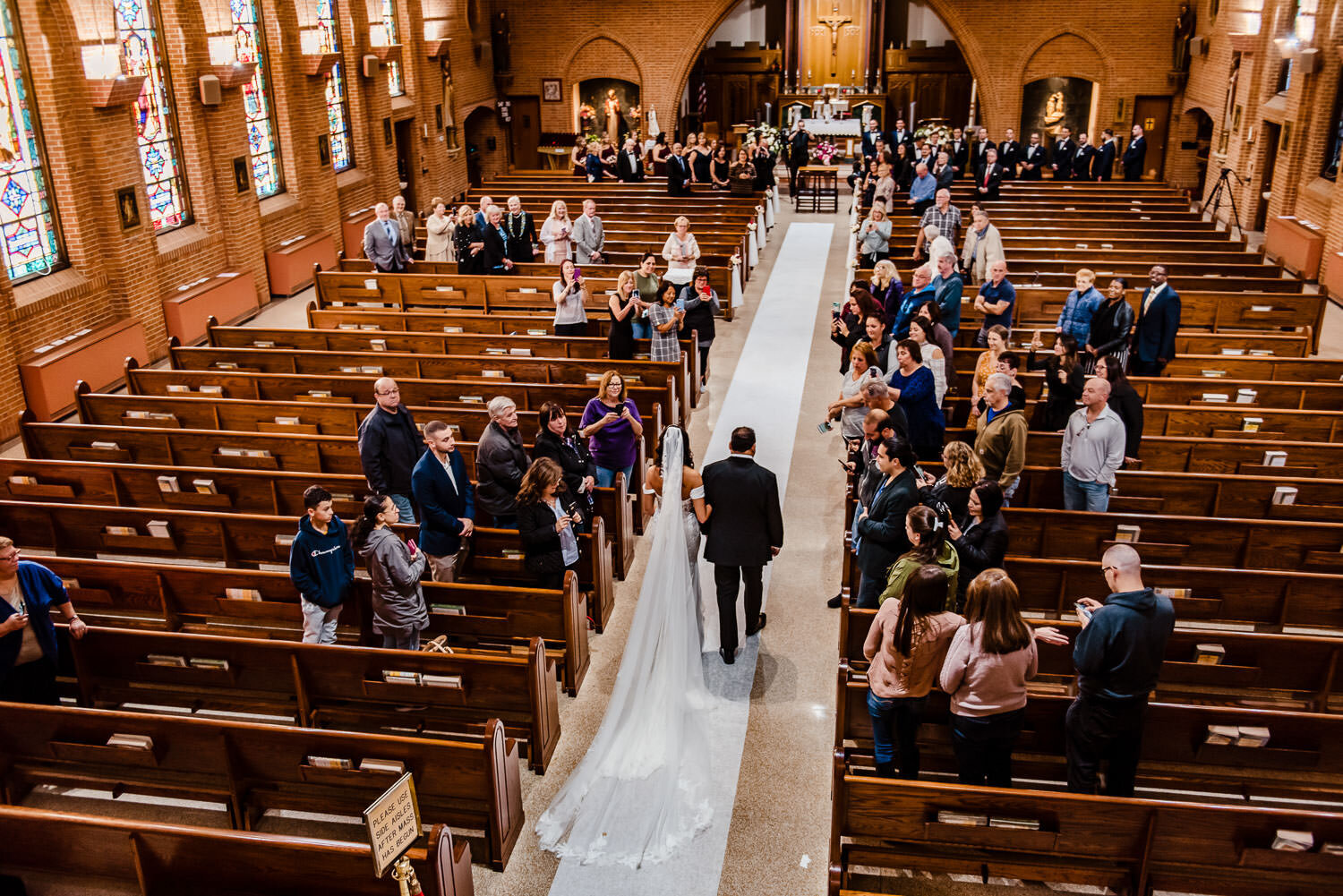 Bride and her dad enter the ceremony at St. Margaret Catholic Sc