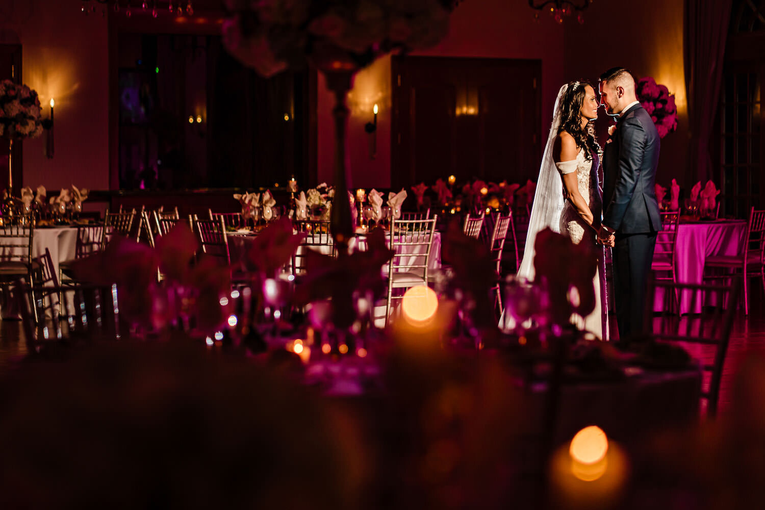 Newlyweds portriat in ballroom at Royalton on the Greens in Melv