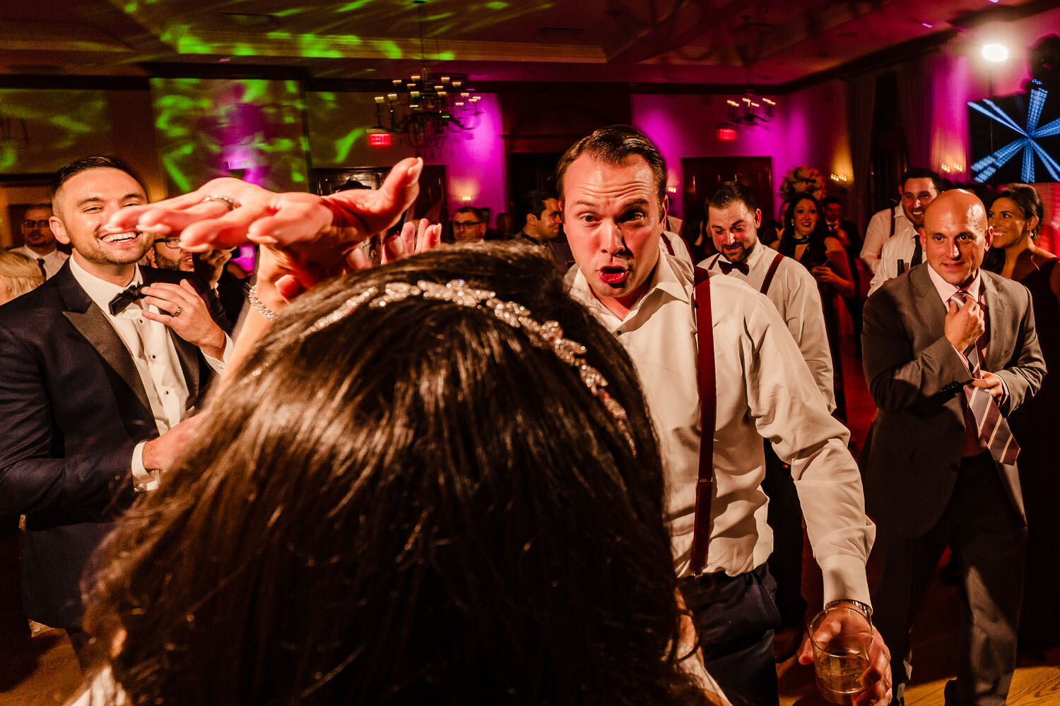 Guests dance during reception at Royalton on the Greens in Melvi