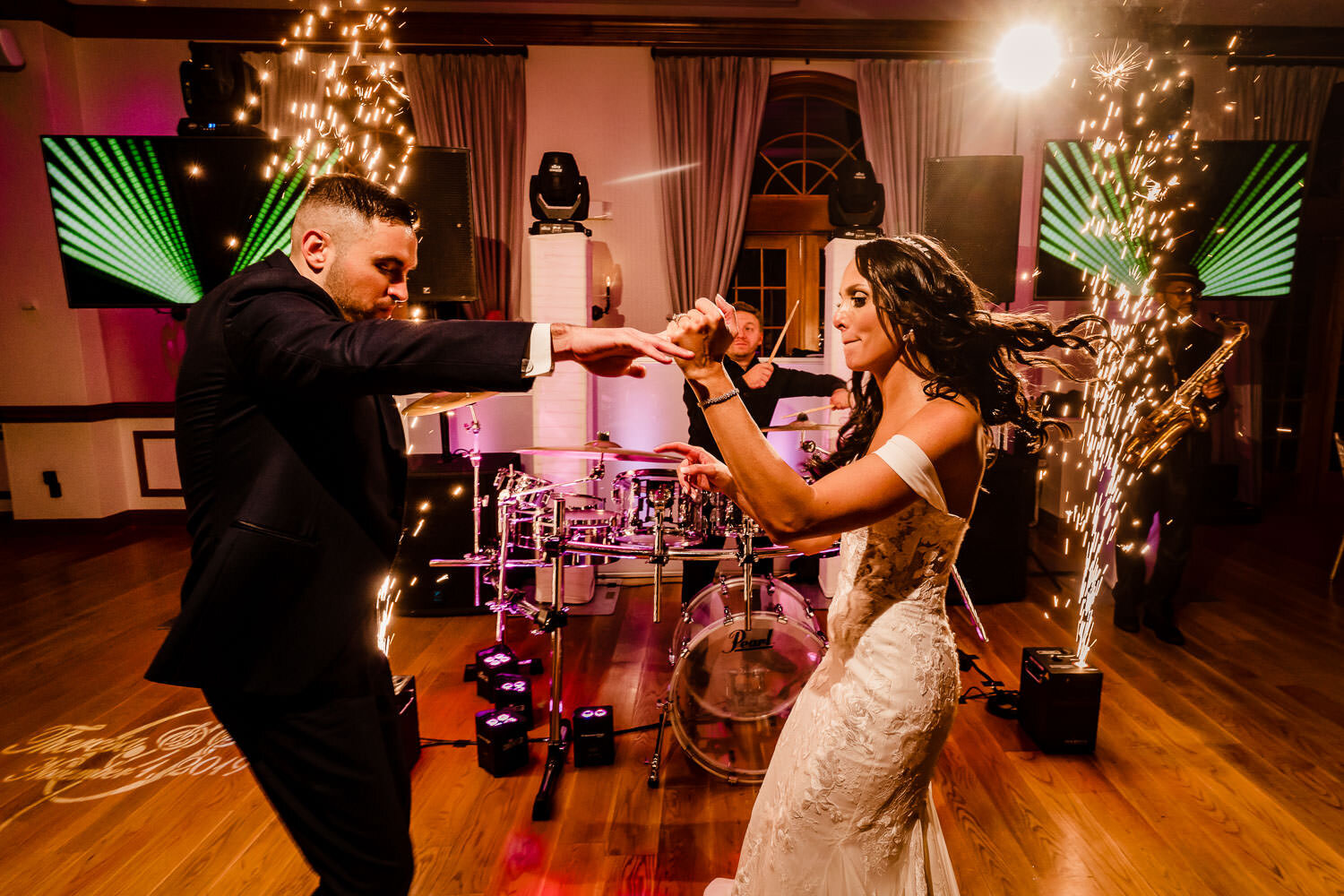 Bride and groom dance with sparkles at Royalton on the Greens in
