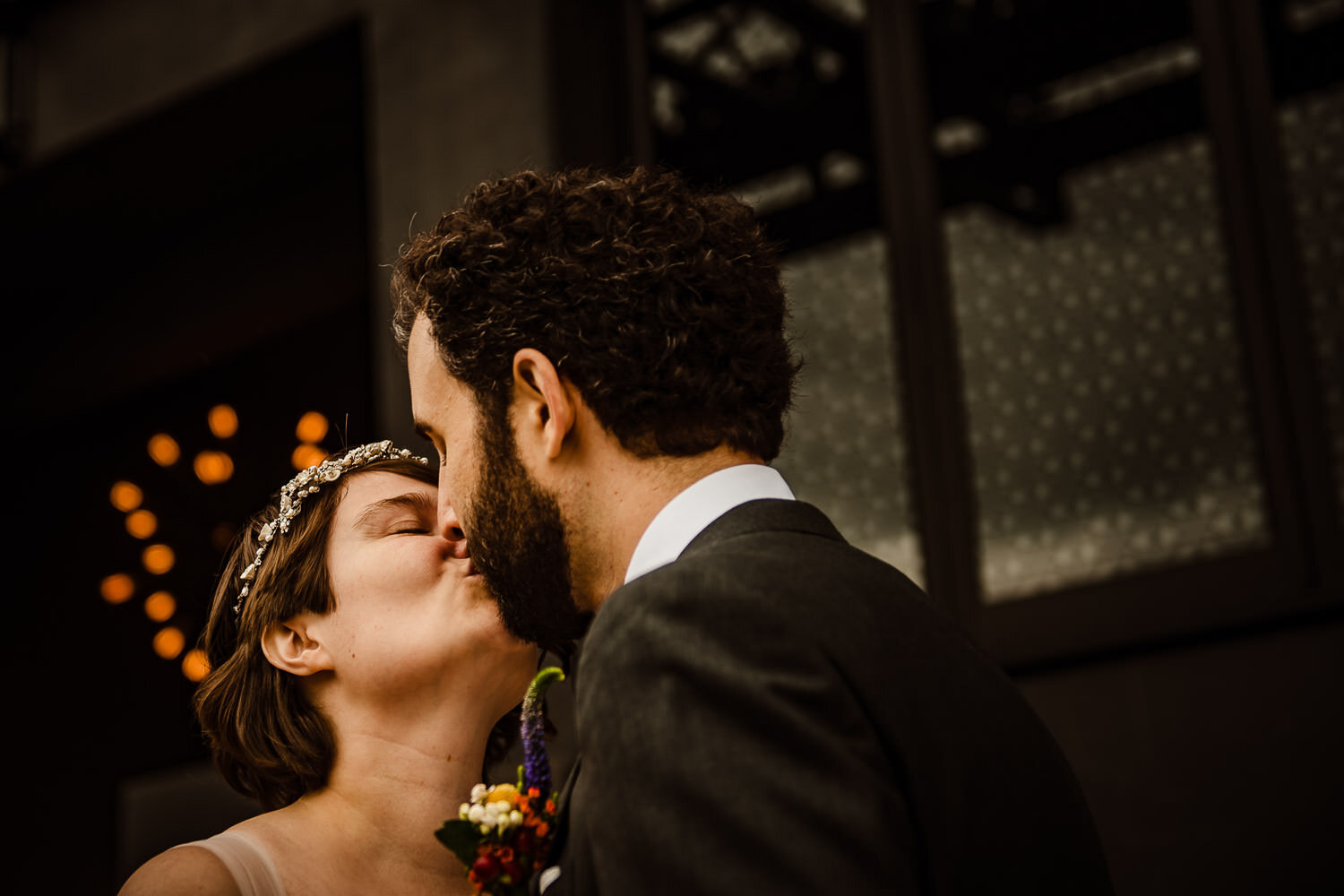 Couple kiss at Paper Factory Hotel in Long Island City