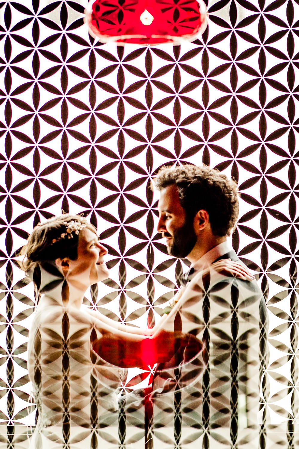 Couple's portrait by the window at Paper Factory Hotel in Long Island City