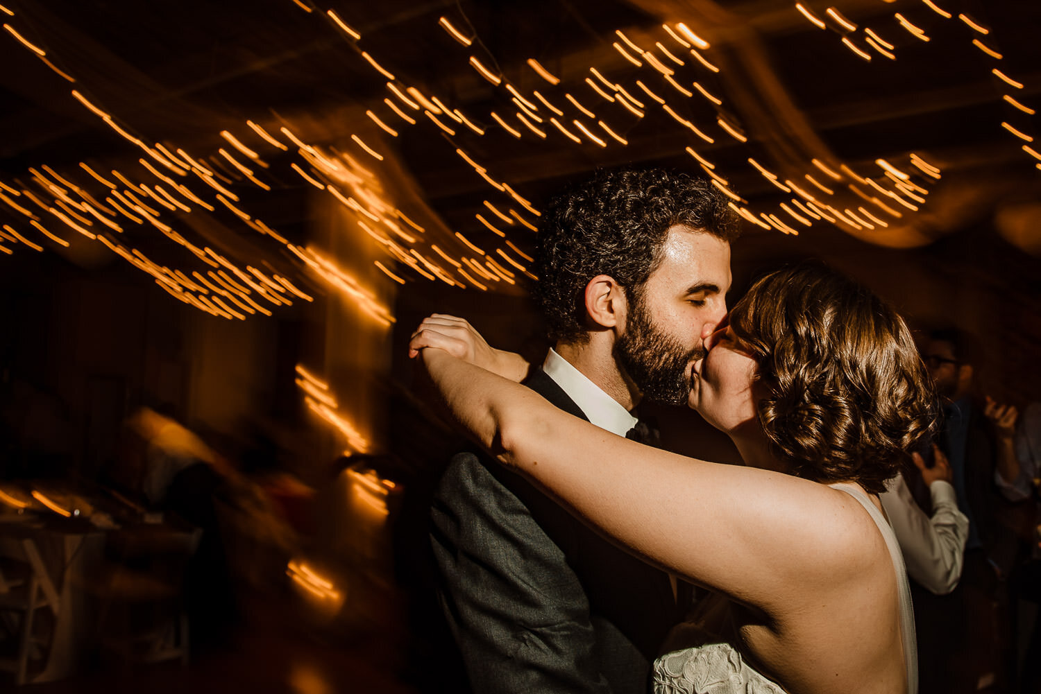 Bride and groom dance during reaction at Aurora Gallery in Long Island City