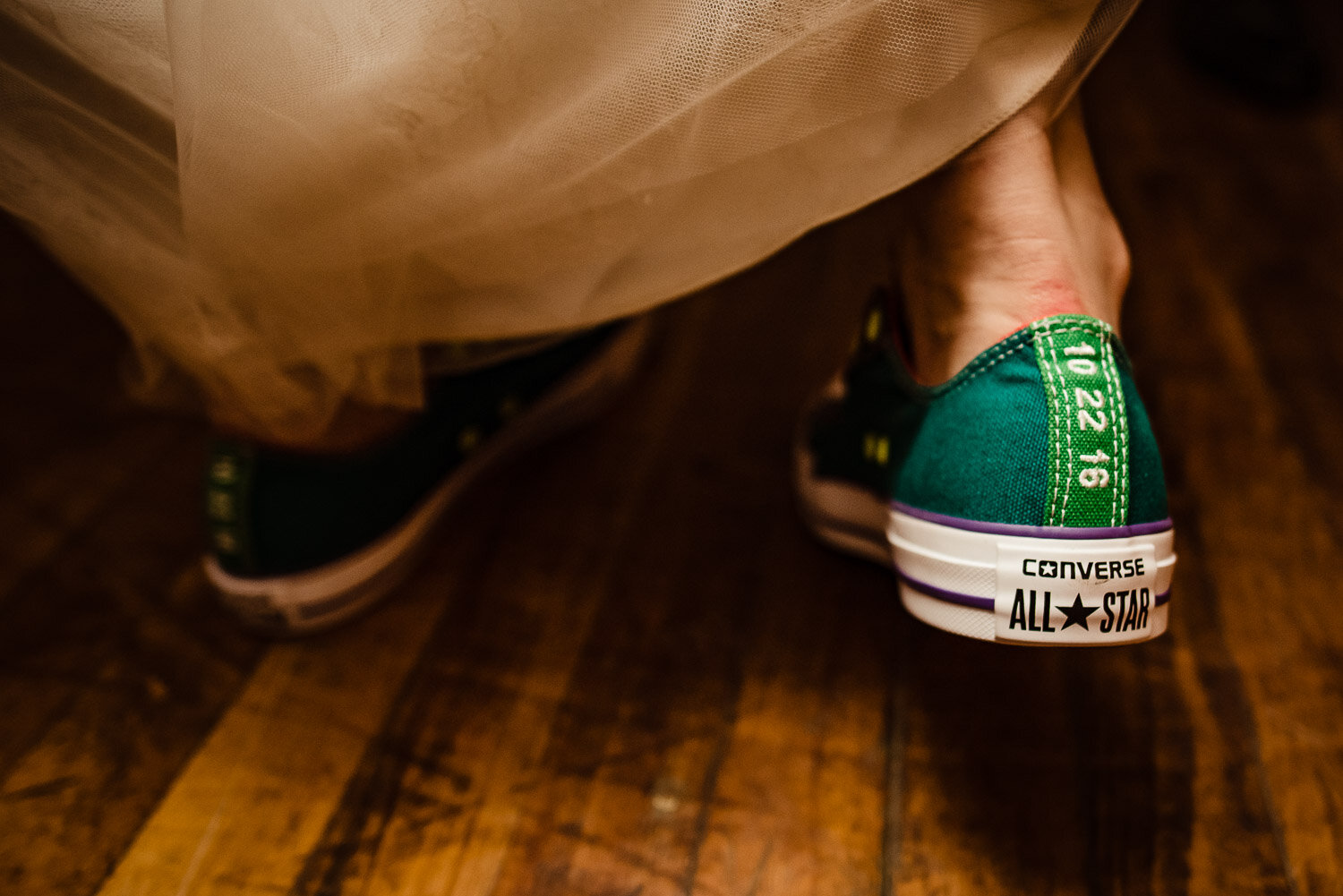 Bride's sneaker with the wedding date 