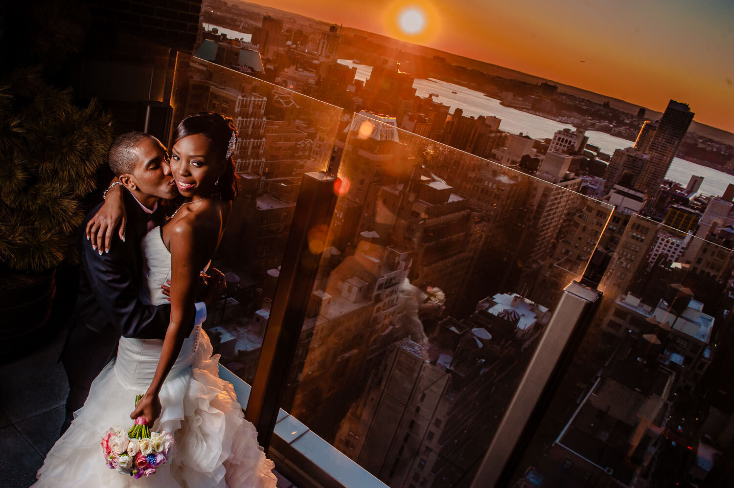 Bride and Groom portrait at sunset on a rooftop