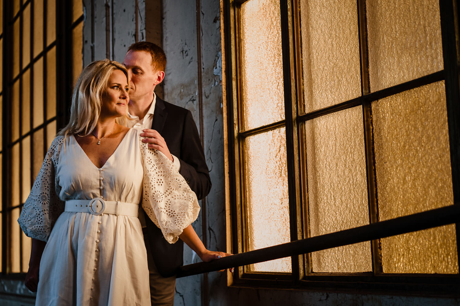 Couple's portrait at Hoboken train station waiting area