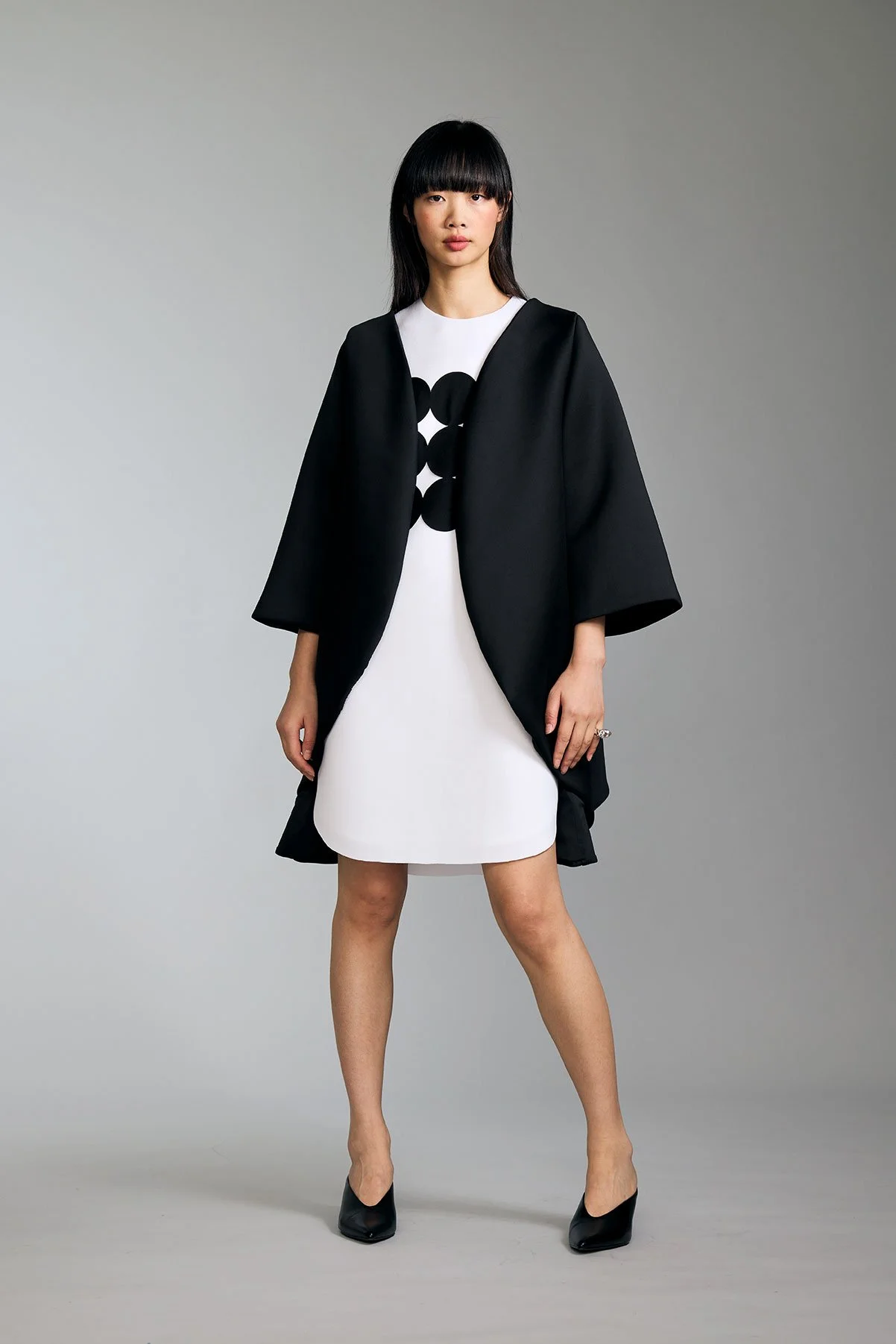 Look19-Shot22-04-22_CircleDress_LinedWhiteNeoprenewithBlackNeopreneEmbellishmentandBackBlackZipClosure.jpg
