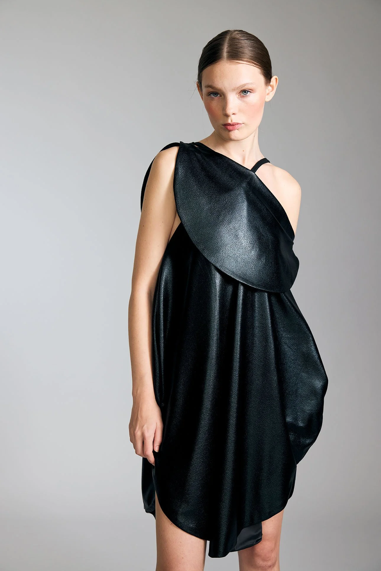 Look5-Shot6-6_SlipDress_FauxBlackLeatherInCoatedNylonwithDetachableCapeCollarSpaghettiStrapsAndSidePockets_kottkomm_circlecollection.jpg